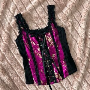Tripp corset black magenta and gold size S adjustable straps back zipper.